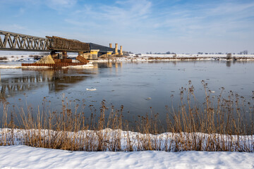 Fototapeta premium The historic bridge over the River Vistula in Tczew. Winter landscape..Poland, Europe.