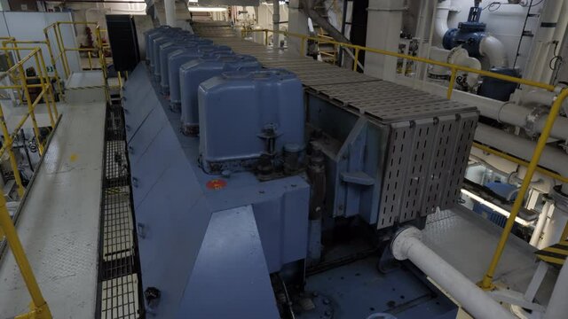 Four stroke main engine in engine room of ship