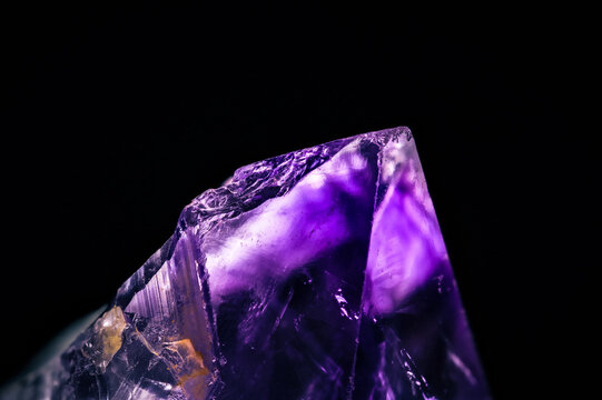 Amethyst rough crystal black background