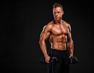 Fototapeta na wymiar Bodybuilder Execising With Weights. Studio Shot of Muscular Men Lifting Weights