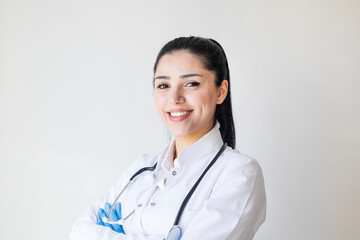 portrait happy woman doctor on grey background