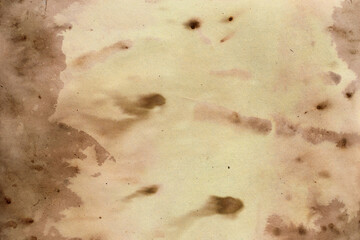 Old brown paper grunge background. Abstract liquid coffee color texture.