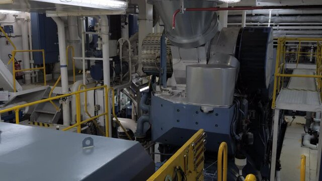 Four stroke main engine with shaft generator in engine room of ship