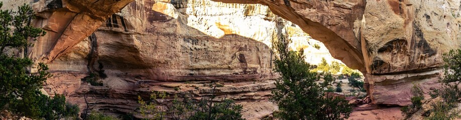 Close up of sandstone arch with last sun rays in Capitol Reef national park in Utah, america