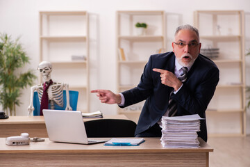 Dead employee working in the office