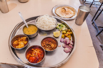 Platter of gujarathi thali in a restaurant