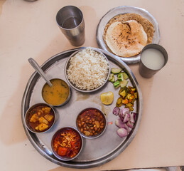 Platter of gujarathi thali in a restaurant