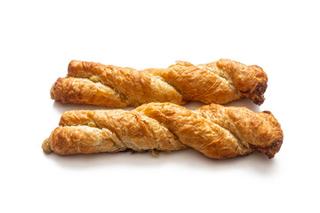 Two puff pastry buns, with minced meat, on a white background