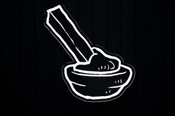 Icons drawings of fast food on a black background, sauce