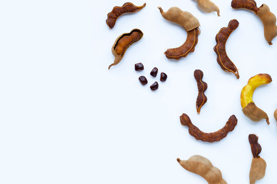 Tamarind tropical fruit on white background. Top view