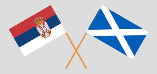 Crossed flags of Serbia and Scotland. Official colors. Correct proportion