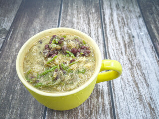 A big cup of cendol, a famous dish for dessert in Malaysia. Selective focus points. Blurred background