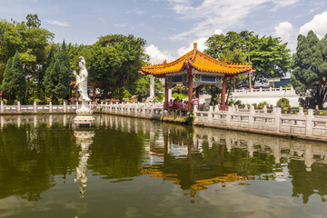 IPOH, MALAYASIA - MARCH 25, 2018: Small pond near Perak Tong temple in Ipoh, Malaysia.