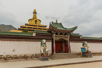 Gate of Gongtang pagoda at Labrang monastery in Xiahe town, Gansu province, China