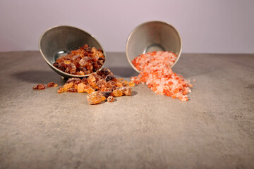 colorful different rock salt on concrete background