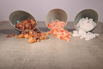 colorful different rock salt on concrete background