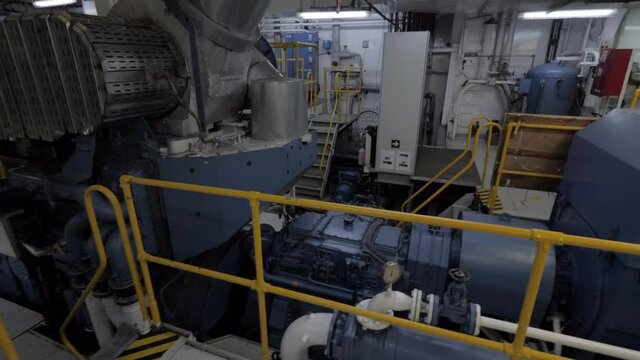 Main engine with shaft generator and gear in engine room of ship
