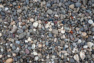 Abstract background with dry pebble stones 