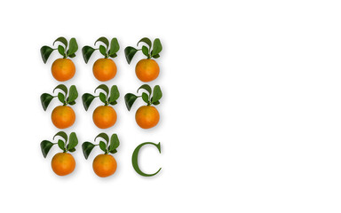 Eight ripe orange clementines and green letter C - vitamin C on white background