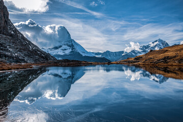 Panoramic view of Matterhorn peak, Switzerland..Matterhorn reflection in the Riffelsee.