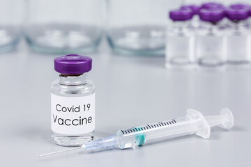 Vials of Covid-19 vaccine and syringe