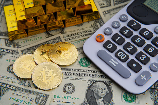 Gold bars with calculator on dollar bills background and bitcoin digital cryptocurrency coin. Bank image and photo background. Money saving investment.