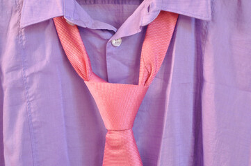 Purple shirt with pink tie