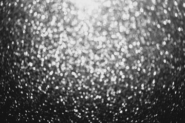 abstract monochrome glitter background bokeh. Elegant black and white background with glitter sparkle bokeh. defocus