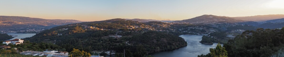 Fototapeta na wymiar Panorama landscape during sunset sunrise in summer in castelo de paiva, douro, oporto, portugal