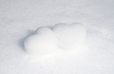 two snow hearts on the snow