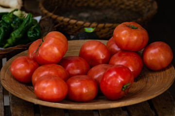 fresh tomatoes in a basket