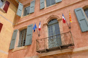 French flags and windows, Roussillon, Vaucluse, Provence-Alpes-Côte d'Azur, France