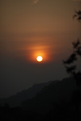 Naklejka premium sunset in the mountains