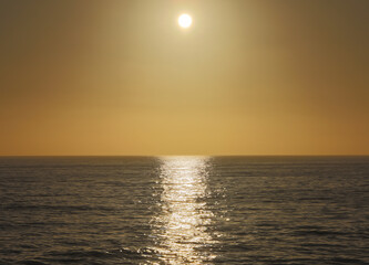 Golden hour sky over the ocean at Sunset Cliffs in San Diego, CA.