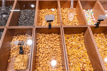 Dry Nuts Mix Assortment in Store Showcase. Organic Hazelnut and Peeled Almond Sell in market. Traditional East Business Snack Shop