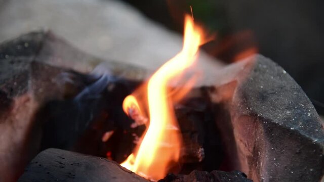 Fire on chaco with smoking.