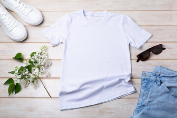 Women’s T-shirt mockup with lilac and white sneakers