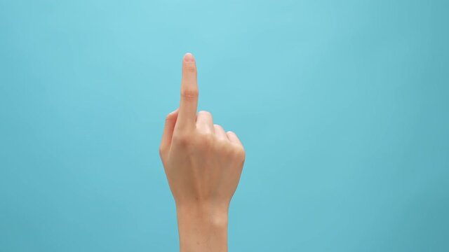 Hand touching and clicking on the blue background, Simulate touch screen phone and tablet.