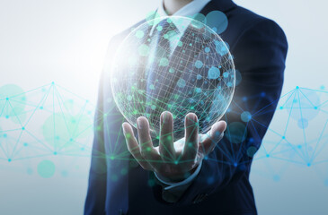 Business and global network technology. Businessperson holding network structure and wire frame...