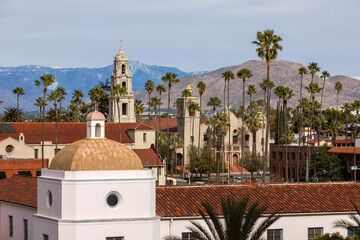 Snow capped mountain view of the historic skyline of Riverside, California, USA.