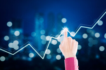 Businessman touching upward arrow on virtual screen