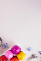  Colorful Easter eggs on a pink background. Bright Easter concept. Copy space.