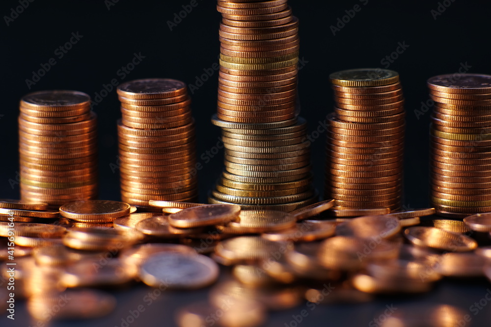 Poster stack of coin on table background and business or finance saving money