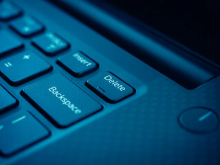 Fototapeta na wymiar Delete key on black keyboard of laptop computer.