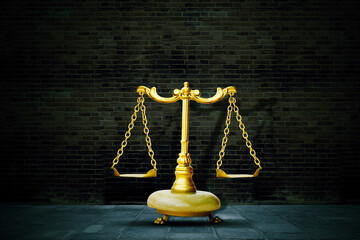 Scales of justice with bricks wall background