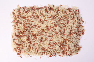 Mixed low glycaemic index healthy rice grain basmati millet buckwheat red rice square heap on white background top view