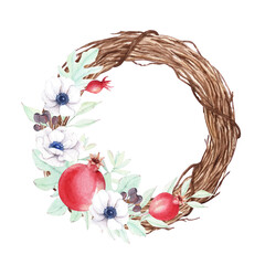 Christmas wreath with pomegranate and anemone flowers