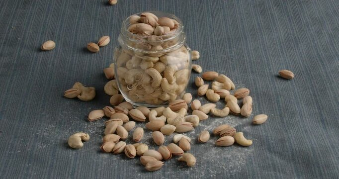 Different types of nuts, nuts in honey, nuts in slowmo, honey
