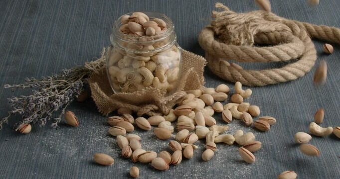Different types of nuts, nuts in honey, nuts in slowmo, honey