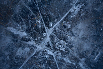 cracked ice texture, abstract seasonal winter cold background, natural ice, broken ice on a lake